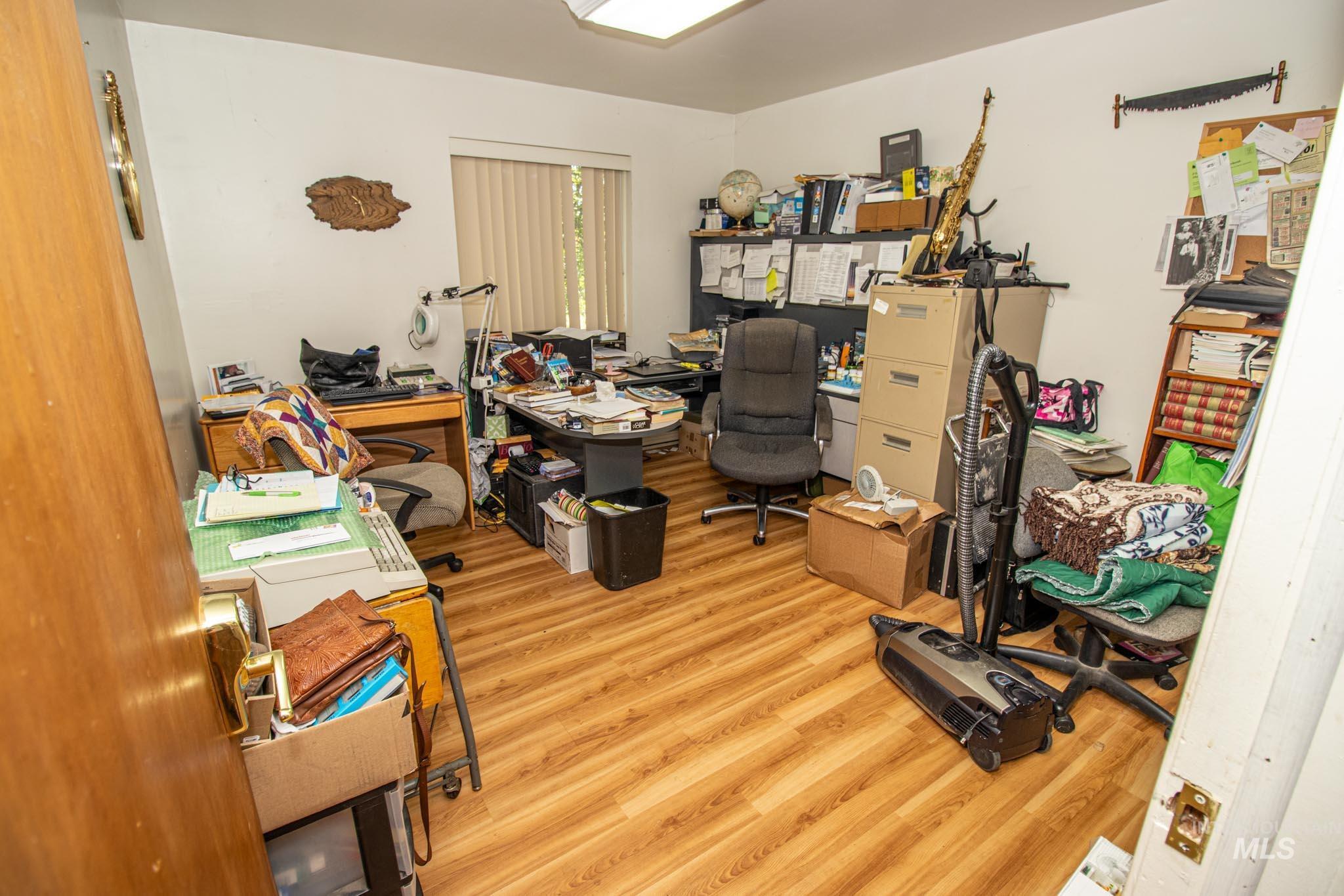 105 Weippe Avenue Weippe, ID 83553 - Photo 22 of 43 Home office with wood finished floors