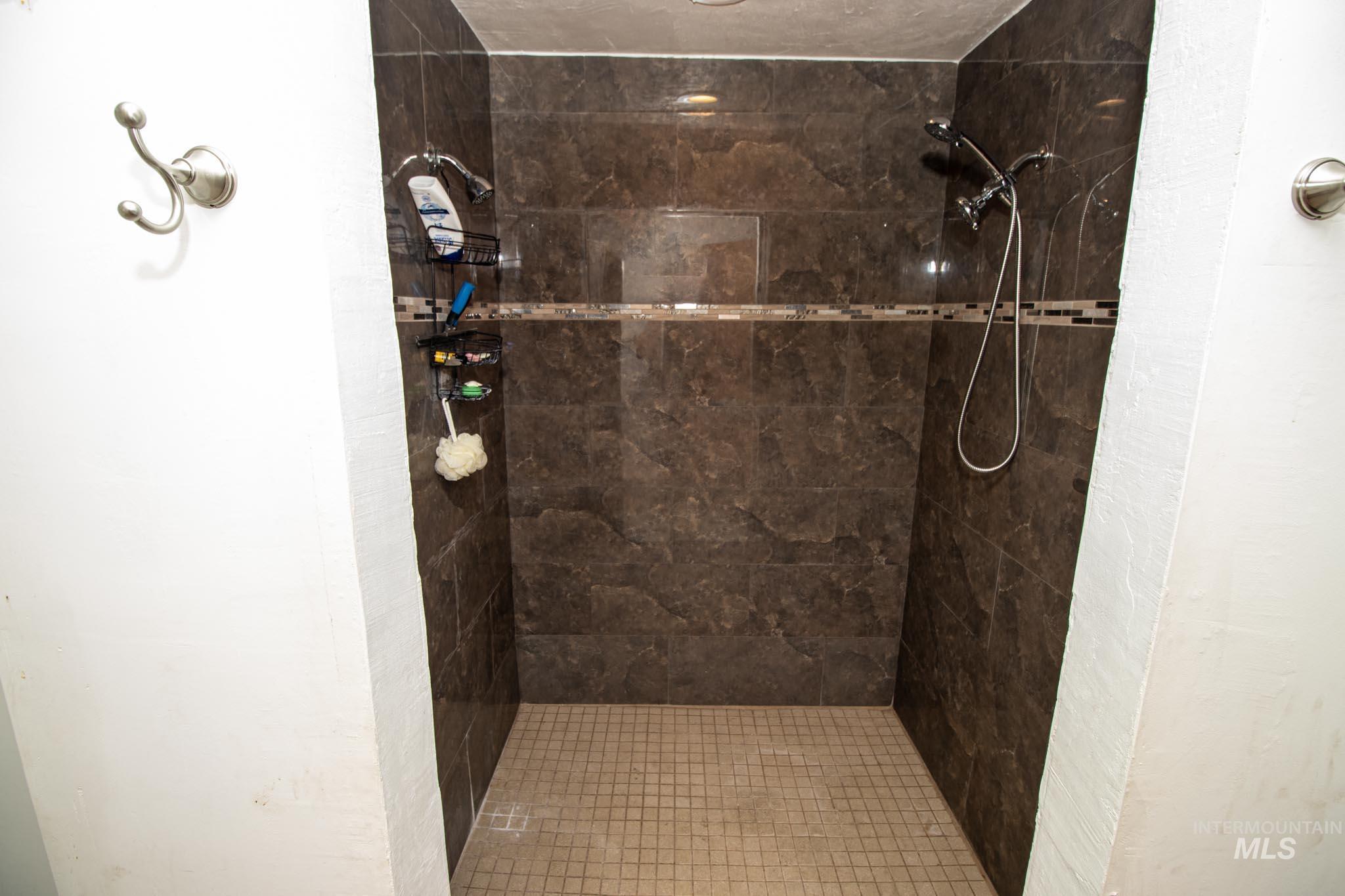 105 Weippe Avenue Weippe, ID 83553 - Photo 37 of 43 Bathroom with tiled shower