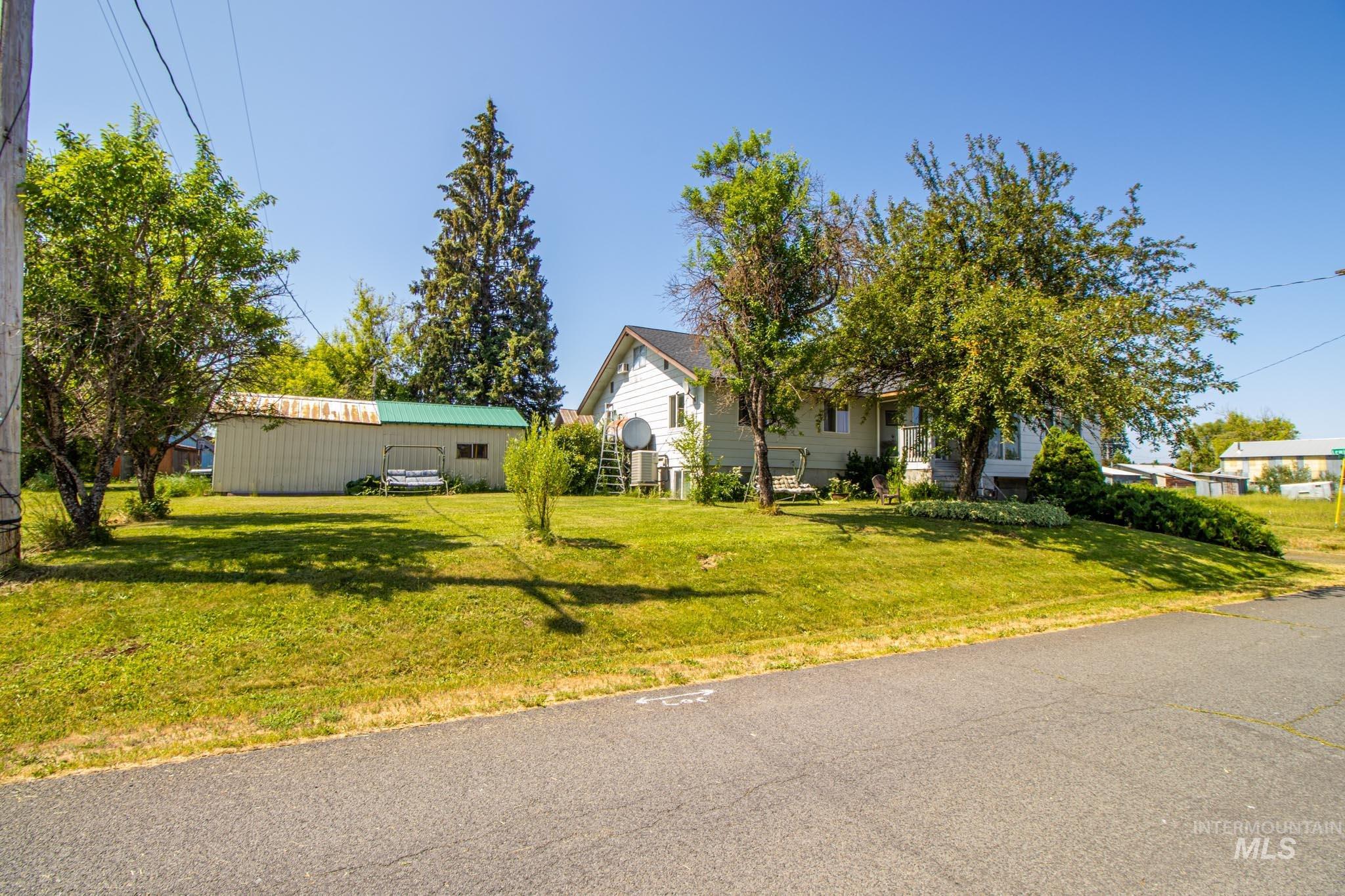 105 Weippe Avenue Weippe, ID 83553 - Photo 4 of 43 View of front of property with a front yard
