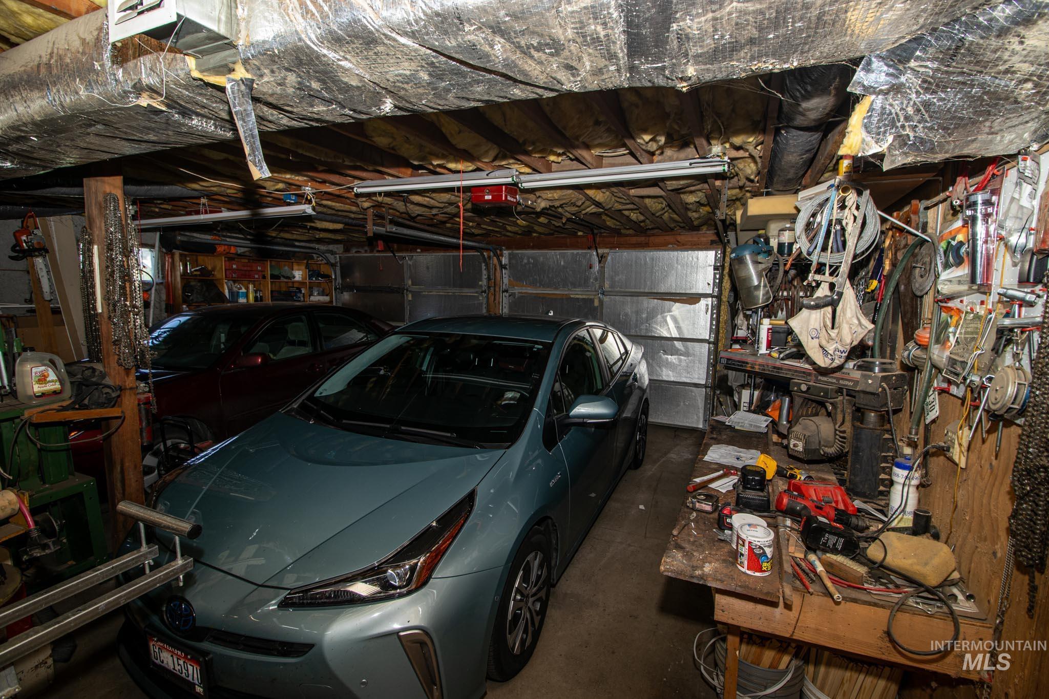 105 Weippe Avenue Weippe, ID 83553 - Photo 42 of 43 Garage featuring a garage door opener