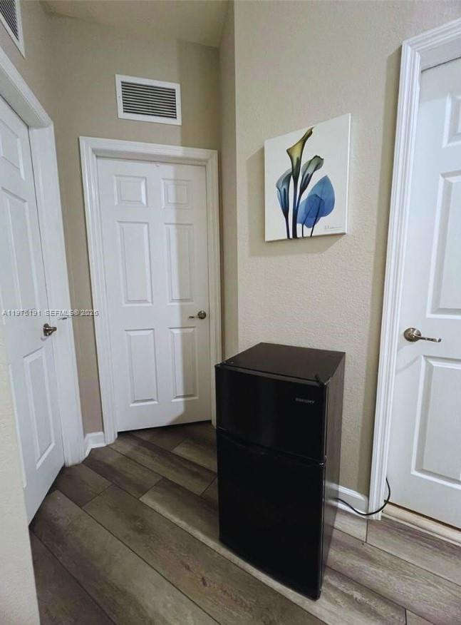 15076 Southwest 117th Terrace Miami, FL 33196 - Photo 15 of 31 a view of bedroom with wooden floor