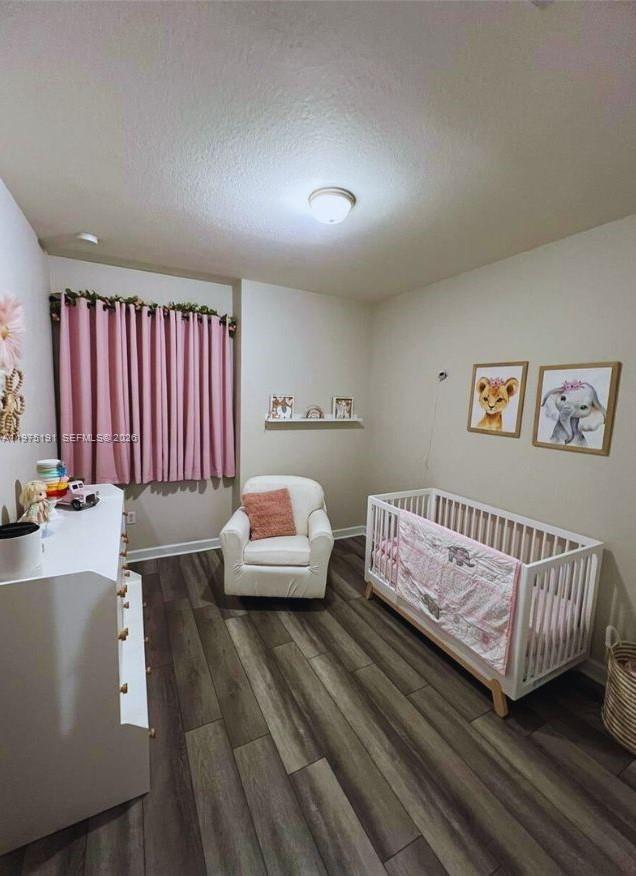 15076 Southwest 117th Terrace Miami, FL 33196 - Photo 20 of 31 a bedroom with furniture and a bathtub