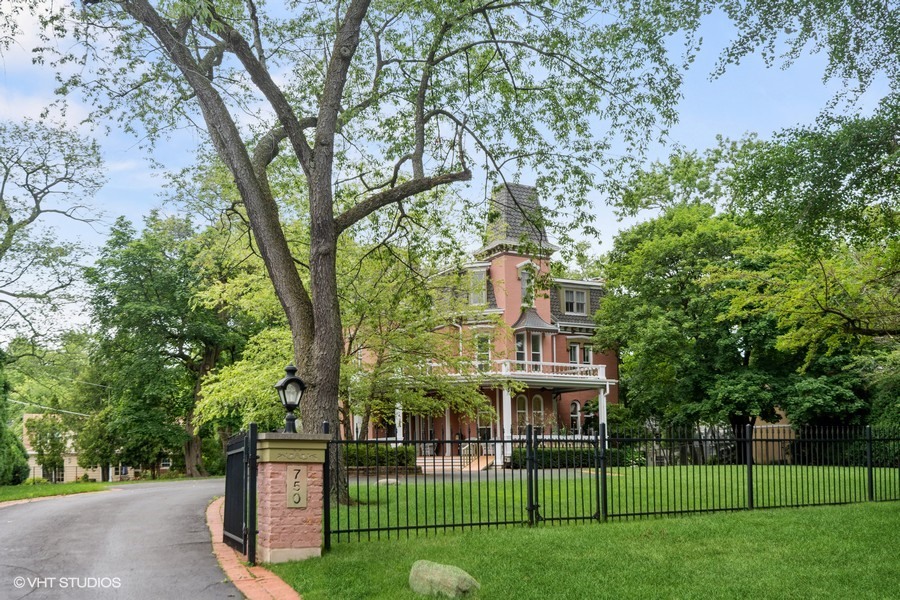 750 Glencoe Drive Glencoe, IL 60022 - Photo 1 of 26 front view of a house with a garden