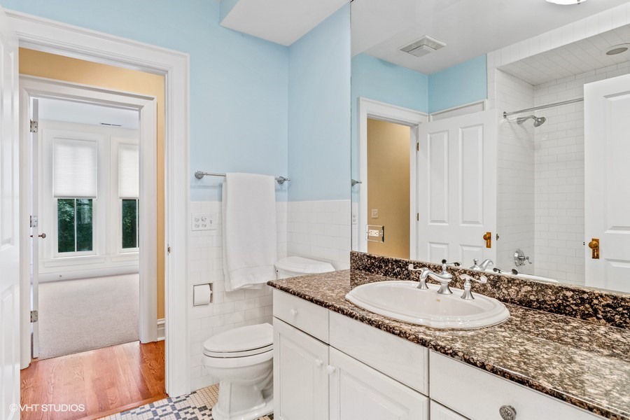 750 Glencoe Drive Glencoe, IL 60022 - Photo 14 of 26 a view of a hallway with a bedroom