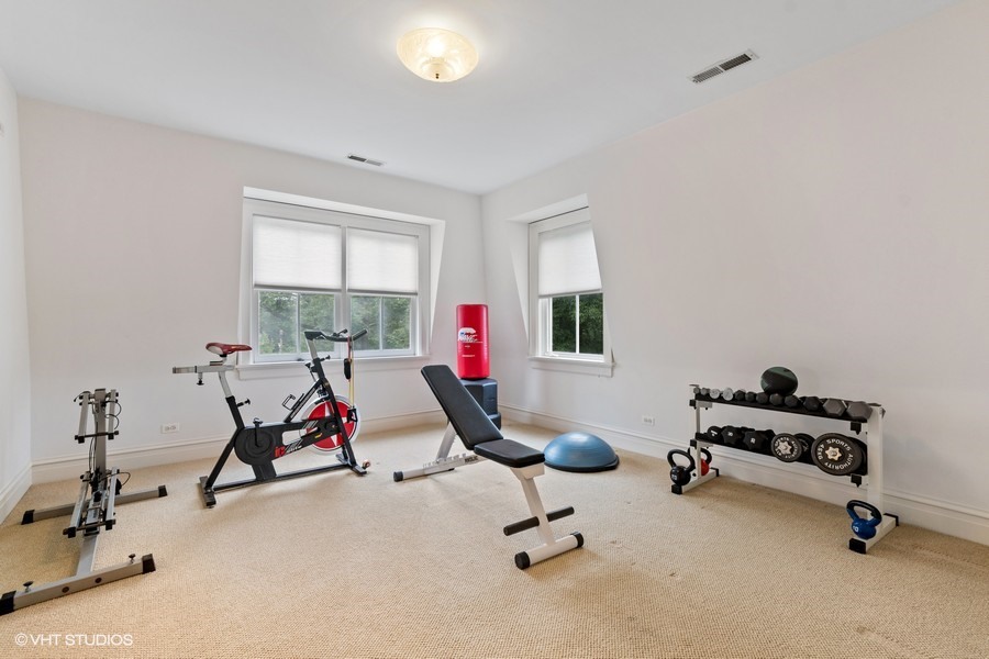 750 Glencoe Drive Glencoe, IL 60022 - Photo 19 of 26 a view of a workspace with gym equipment