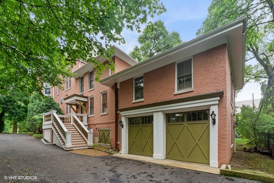750 Glencoe Drive Glencoe, IL 60022 - Photo 3 of 26 a front view of a house with a yard