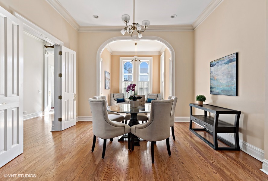 750 Glencoe Drive Glencoe, IL 60022 - Photo 9 of 26 a view of a dining room with furniture window and wooden floor