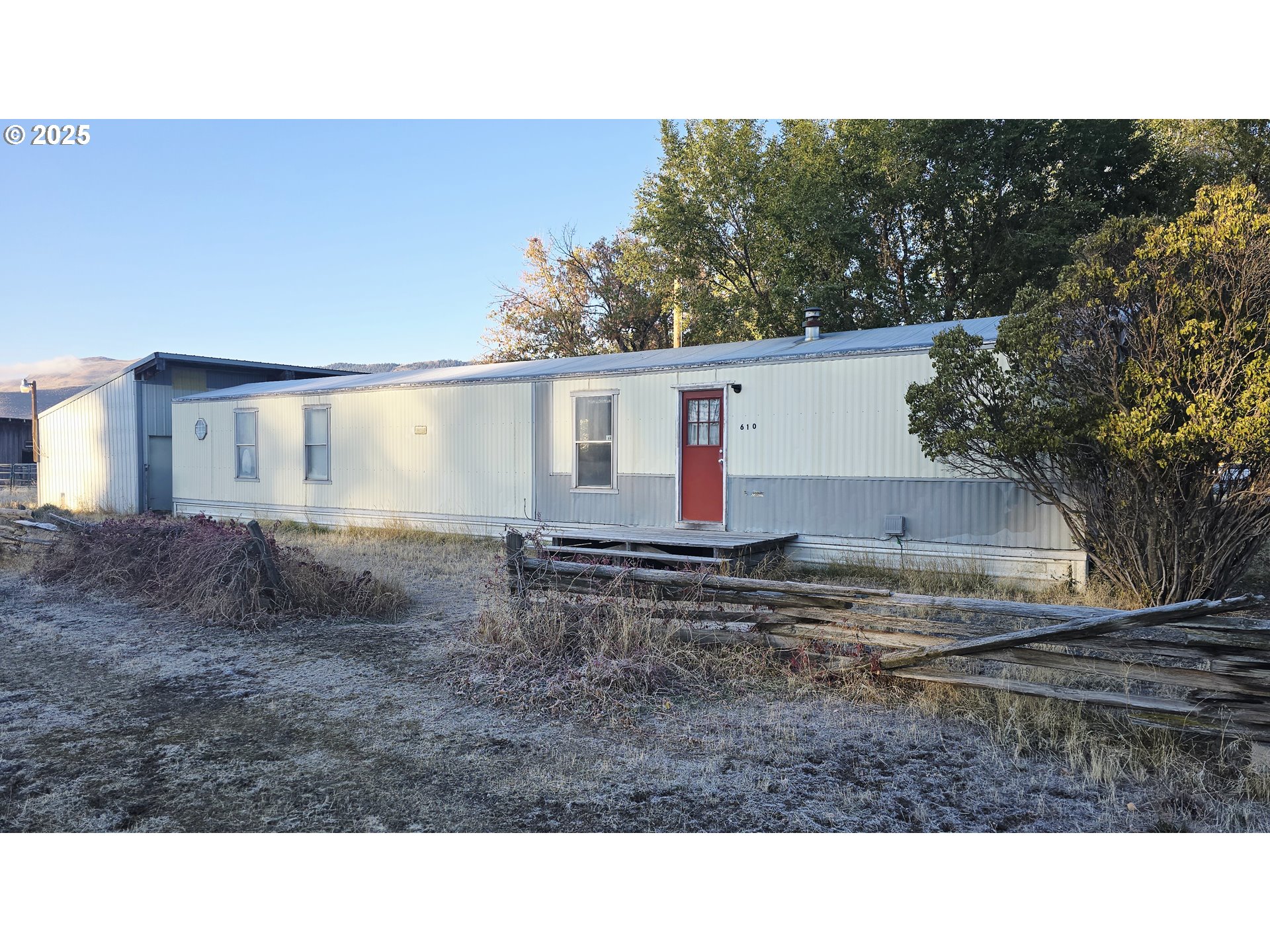 a black and white photo of a house