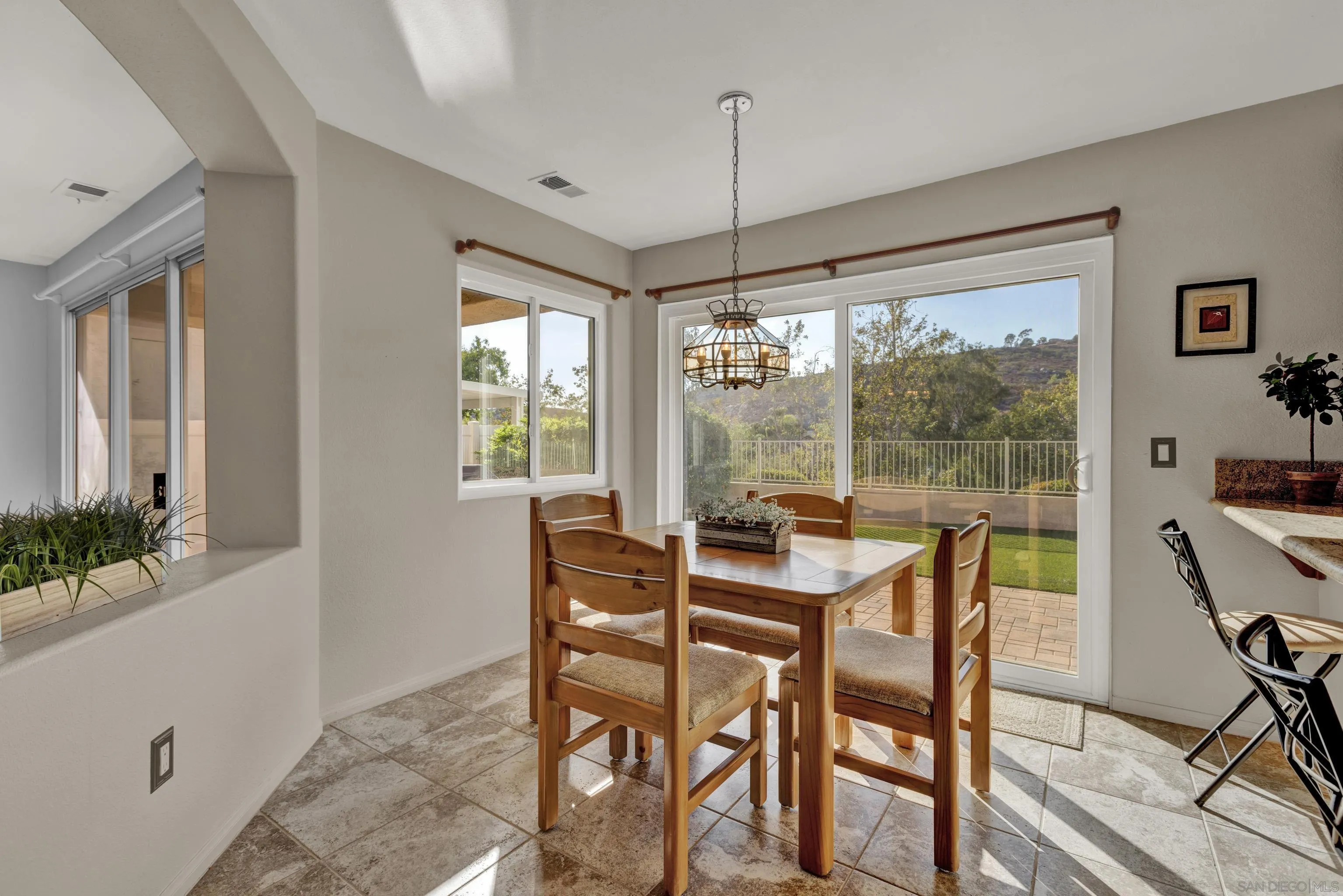 15550 Garden Road Poway, CA 92064 - Photo 17 of 48 a view of a dining room with furniture window and outside view