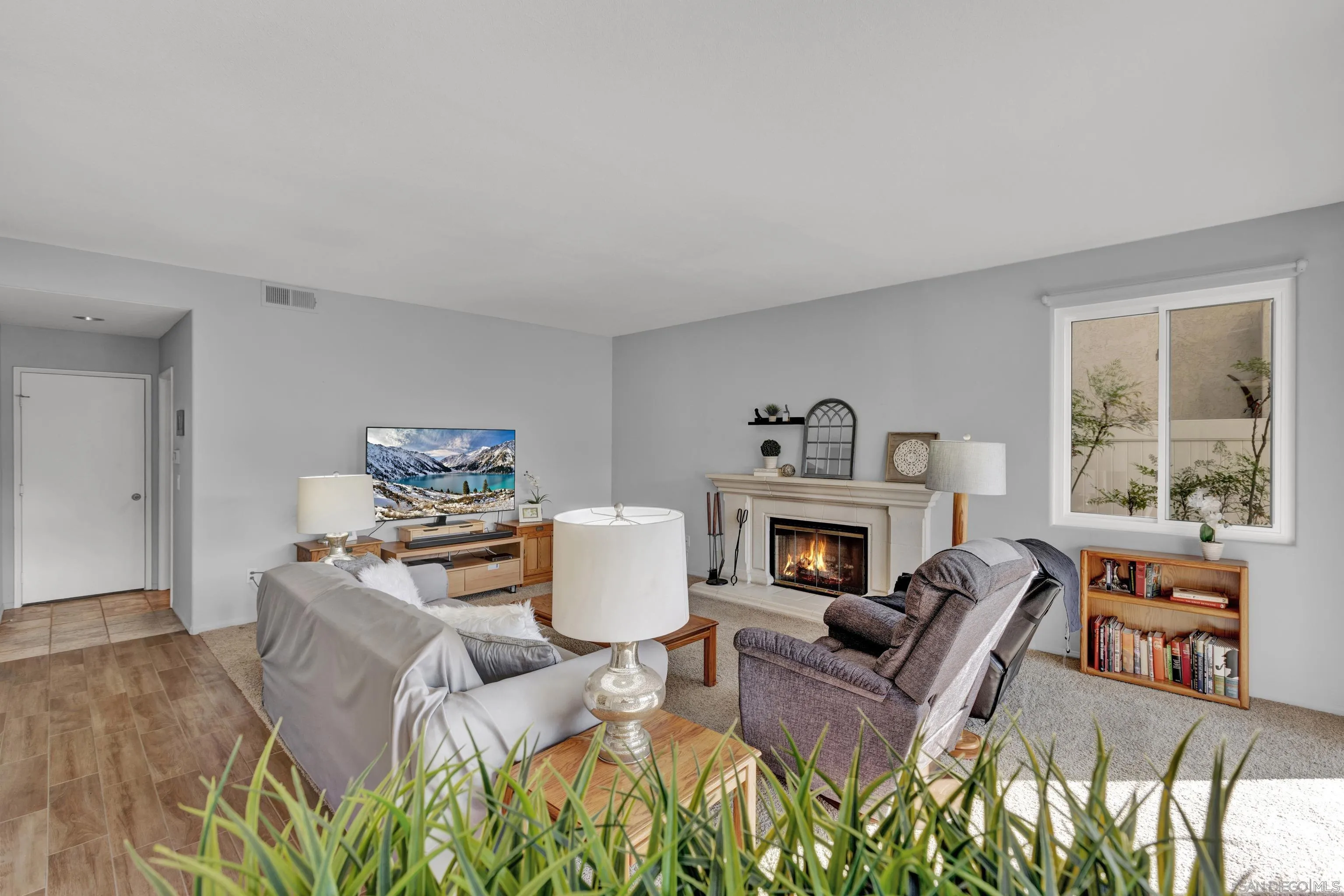 15550 Garden Road Poway, CA 92064 - Photo 18 of 48 a living room with furniture fireplace and a window