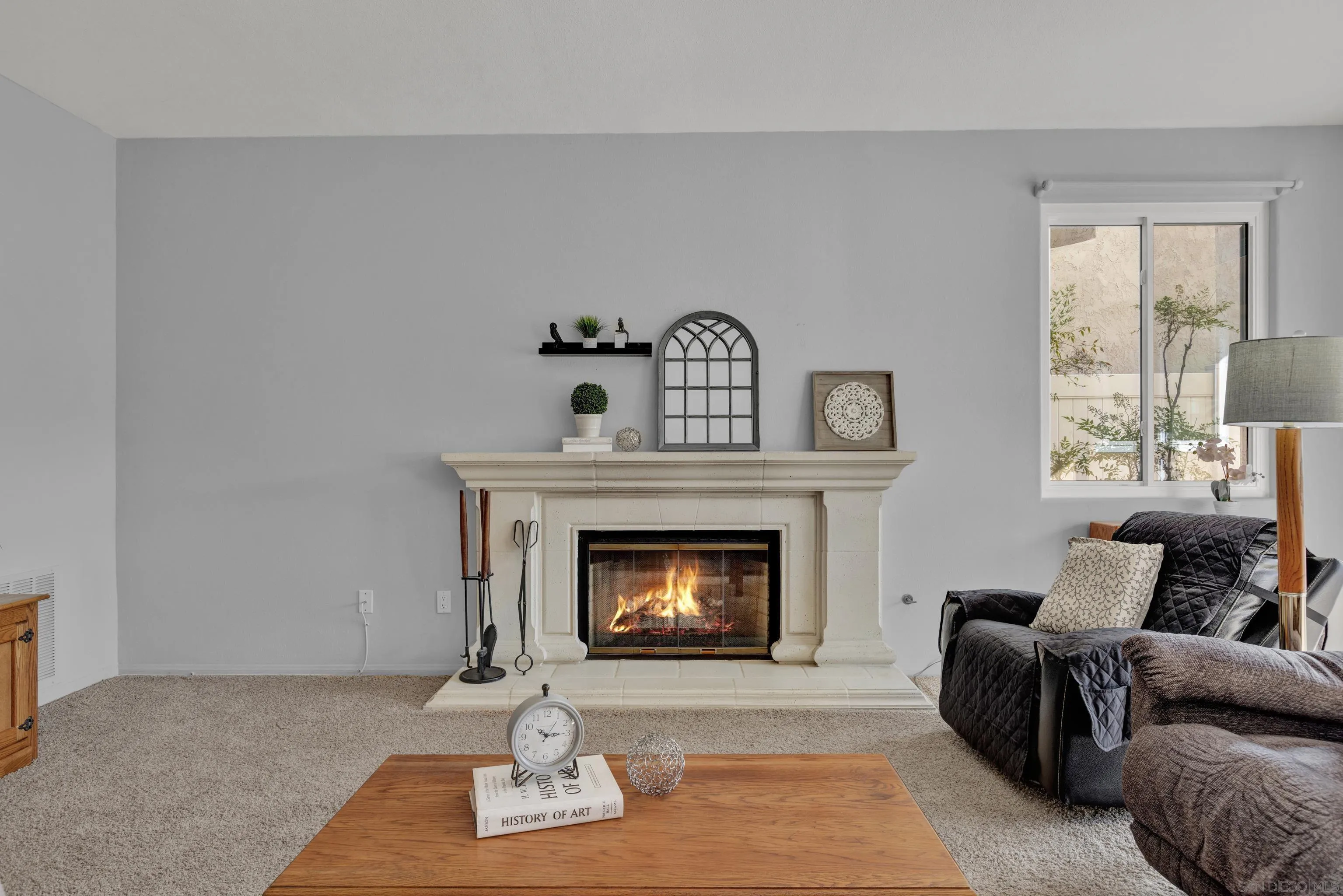 15550 Garden Road Poway, CA 92064 - Photo 21 of 48 a living room with furniture and a fireplace
