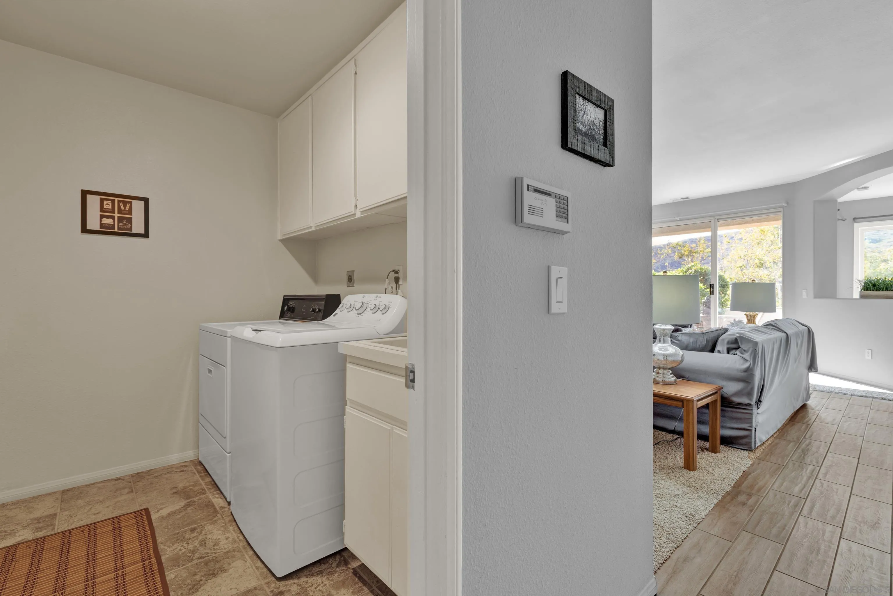 15550 Garden Road Poway, CA 92064 - Photo 23 of 48 a bedroom with a bed and wooden floor