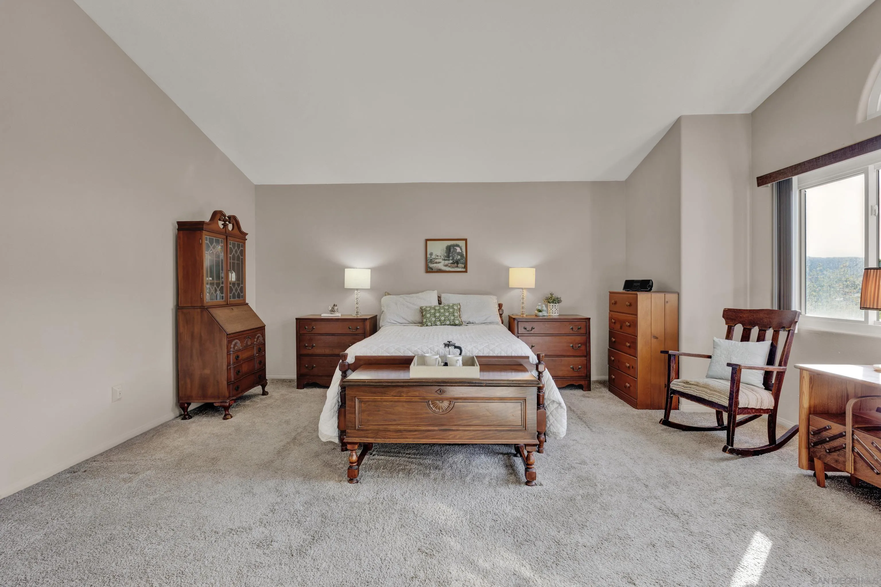 15550 Garden Road Poway, CA 92064 - Photo 26 of 48 a bed room with a bed and a chair