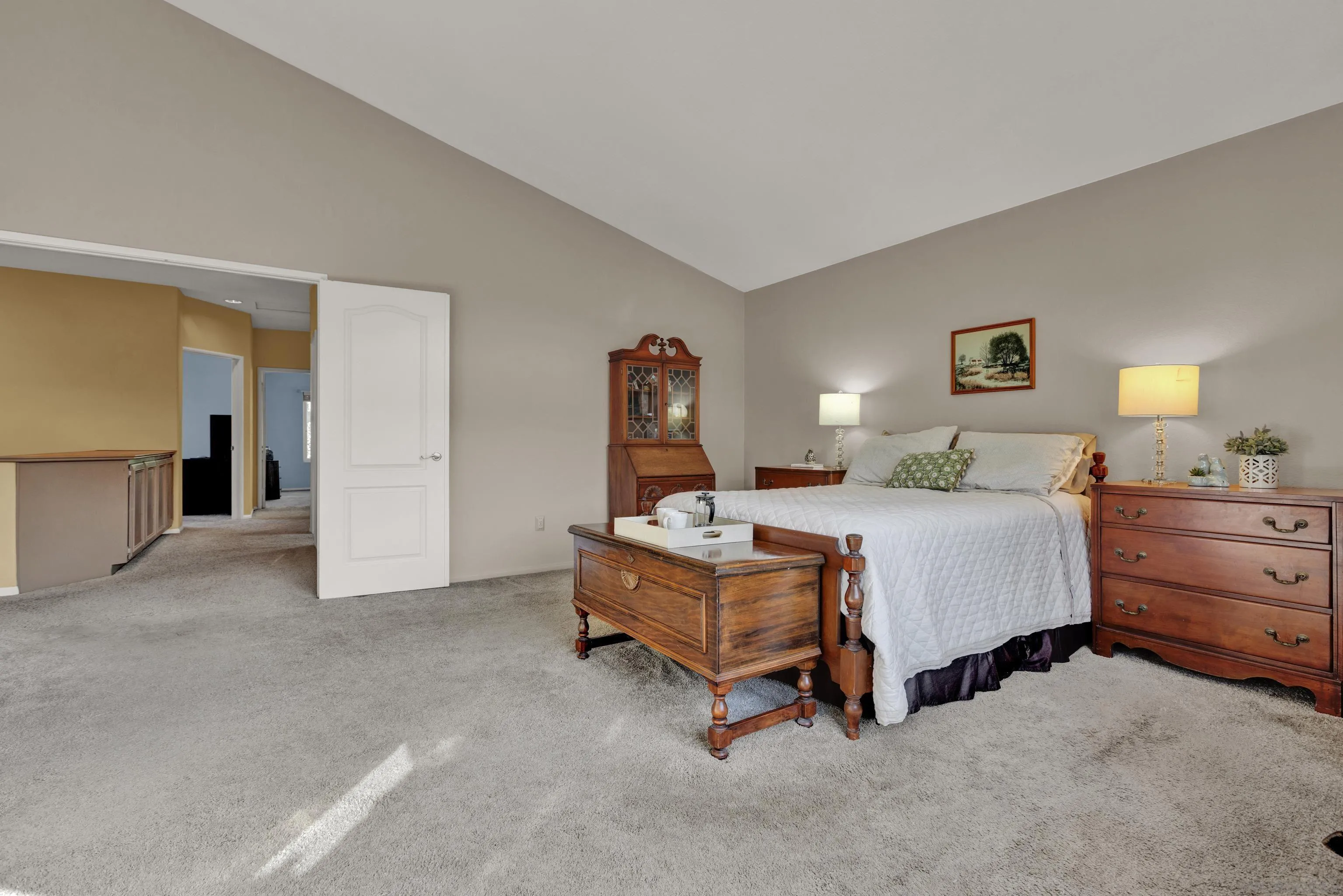 15550 Garden Road Poway, CA 92064 - Photo 32 of 48 a bed room with a bed and a dresser