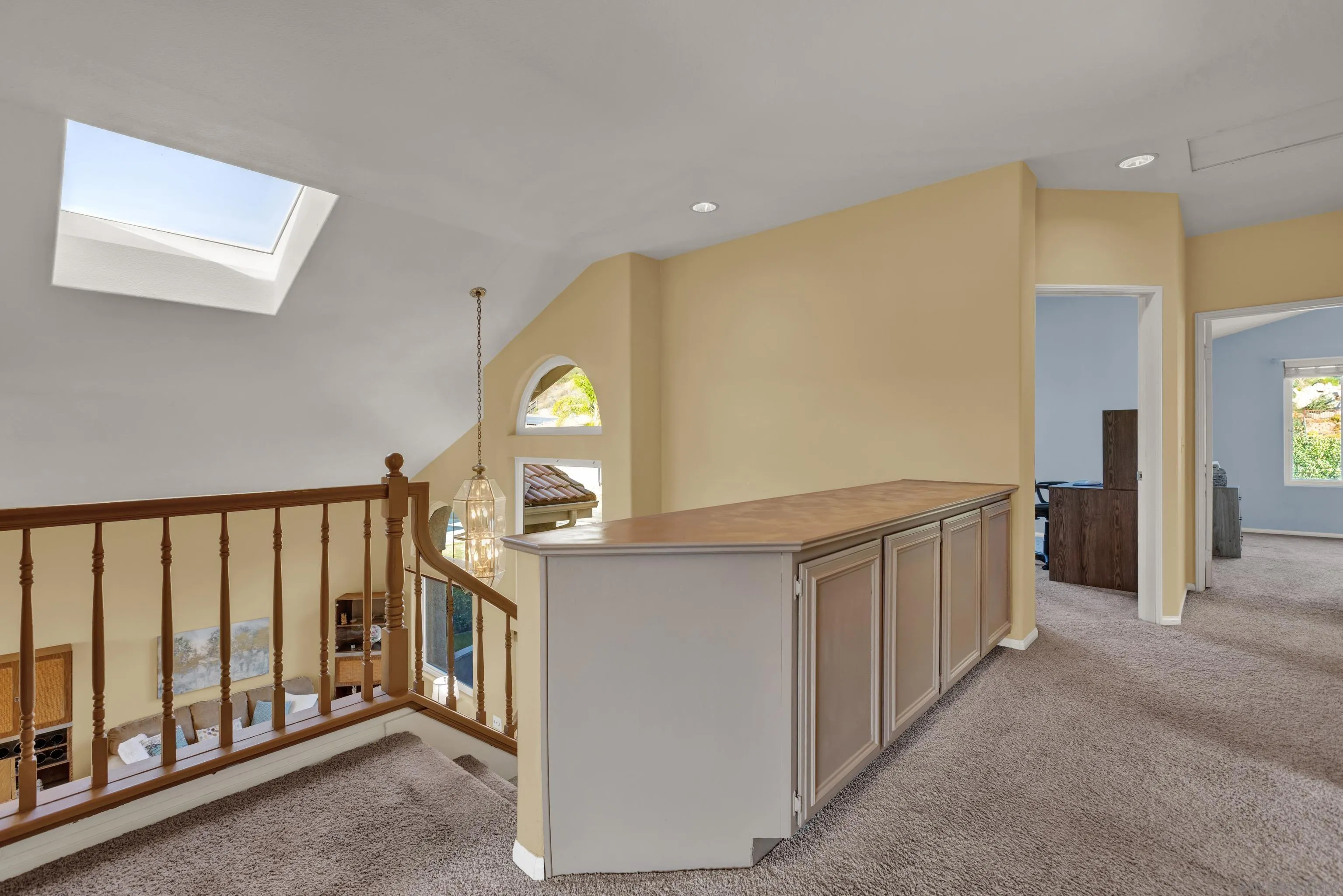 15550 Garden Road Poway, CA 92064 - Photo 33 of 48 a view of a hallway with windows