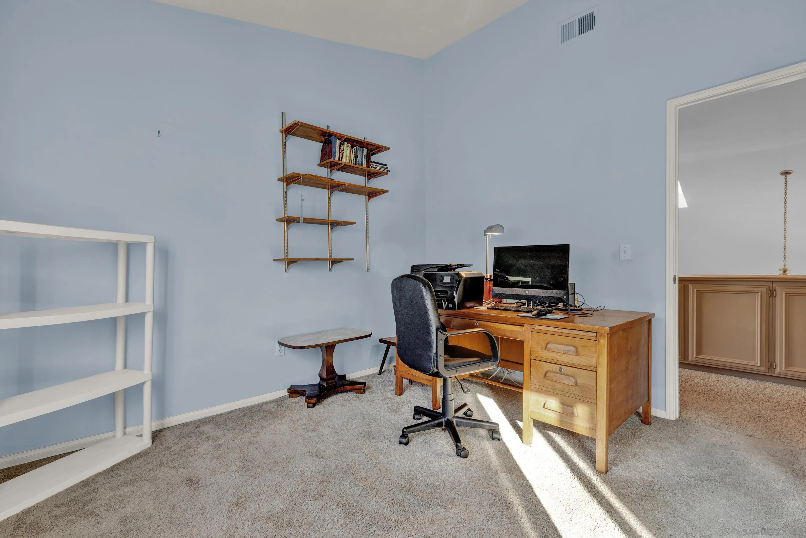 15550 Garden Road Poway, CA 92064 - Photo 35 of 48 a view of a workspace with furniture and a window