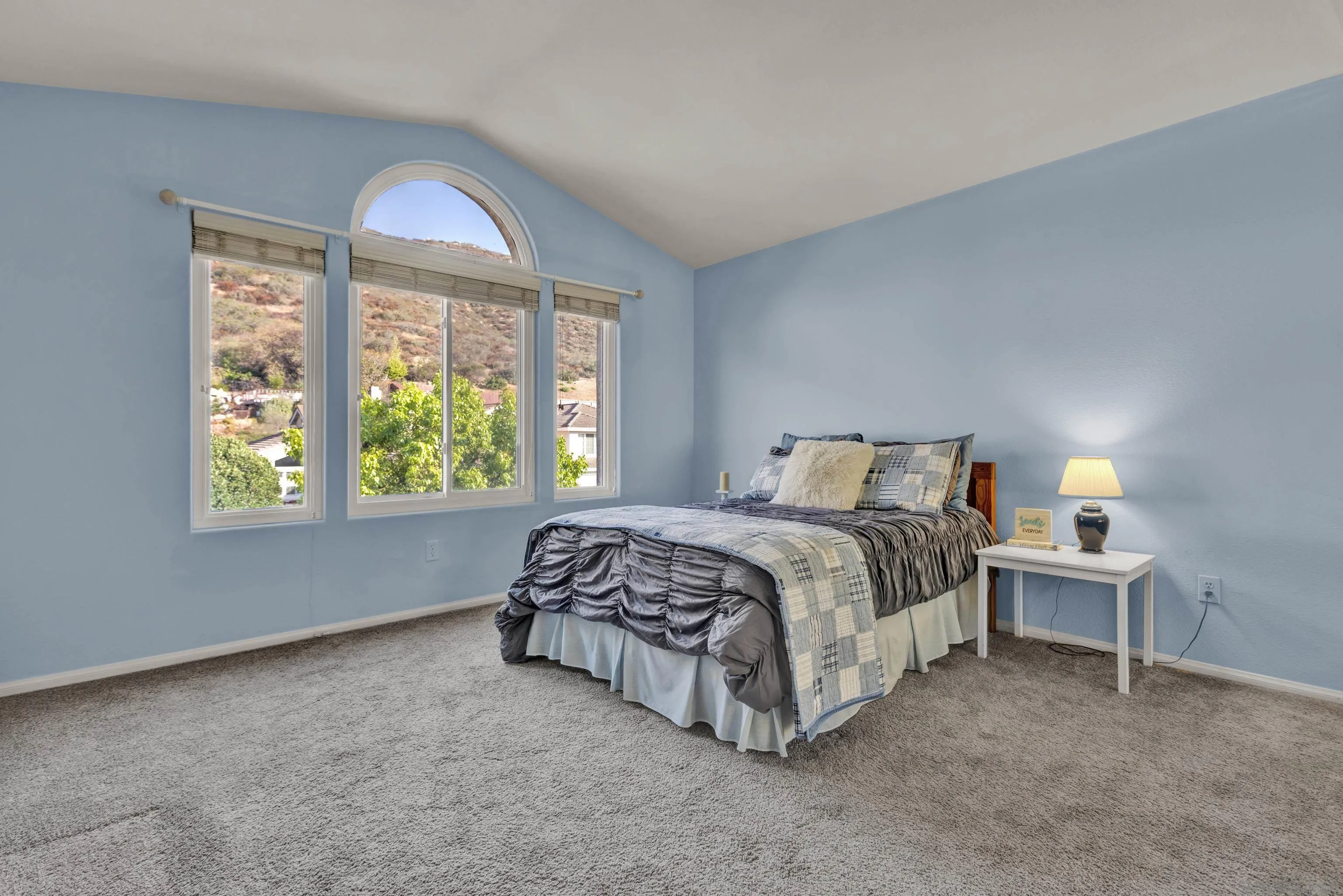 15550 Garden Road Poway, CA 92064 - Photo 41 of 48 a spacious bedroom with a bed and a window