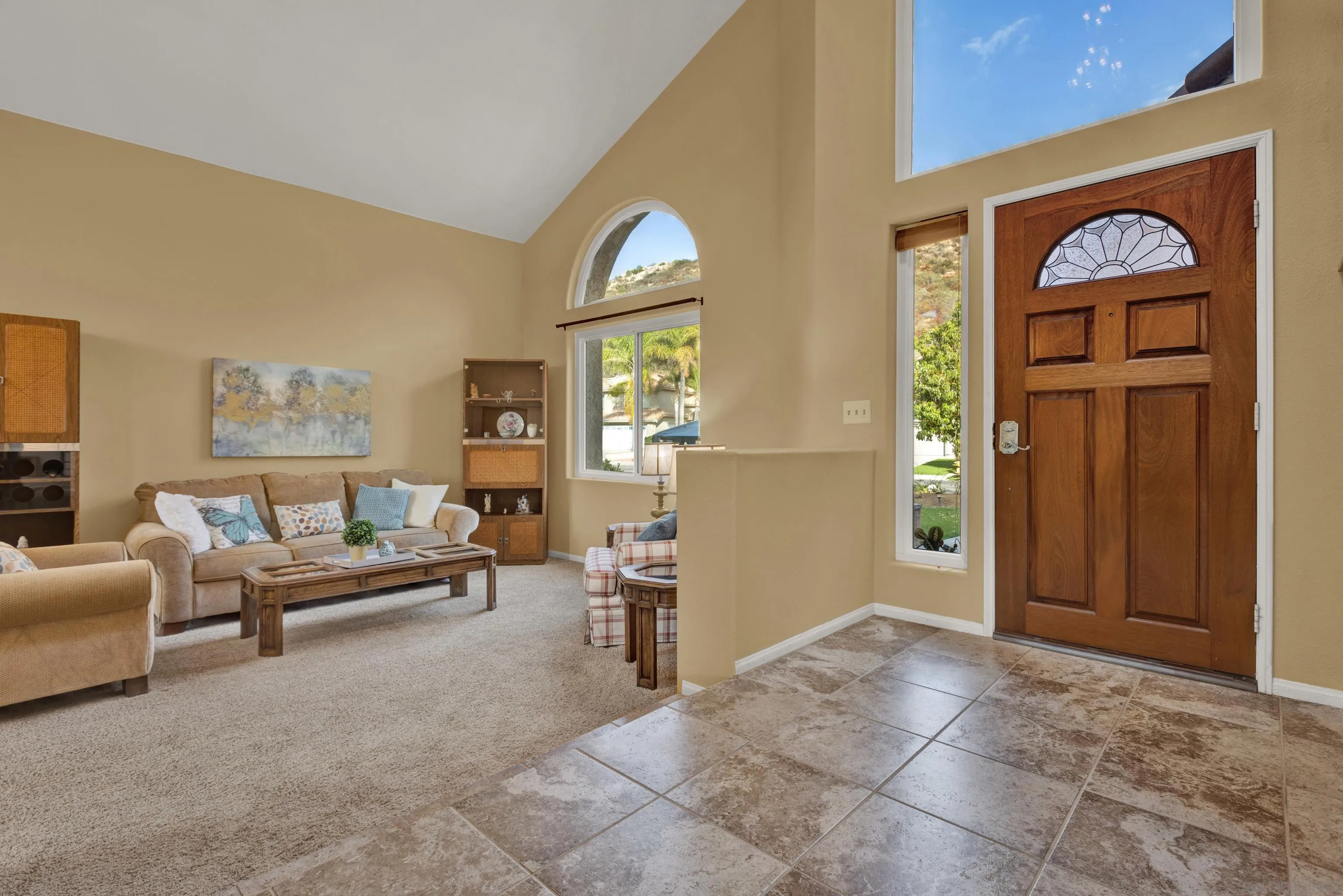 15550 Garden Road Poway, CA 92064 - Photo 7 of 48 a living room with furniture and a window