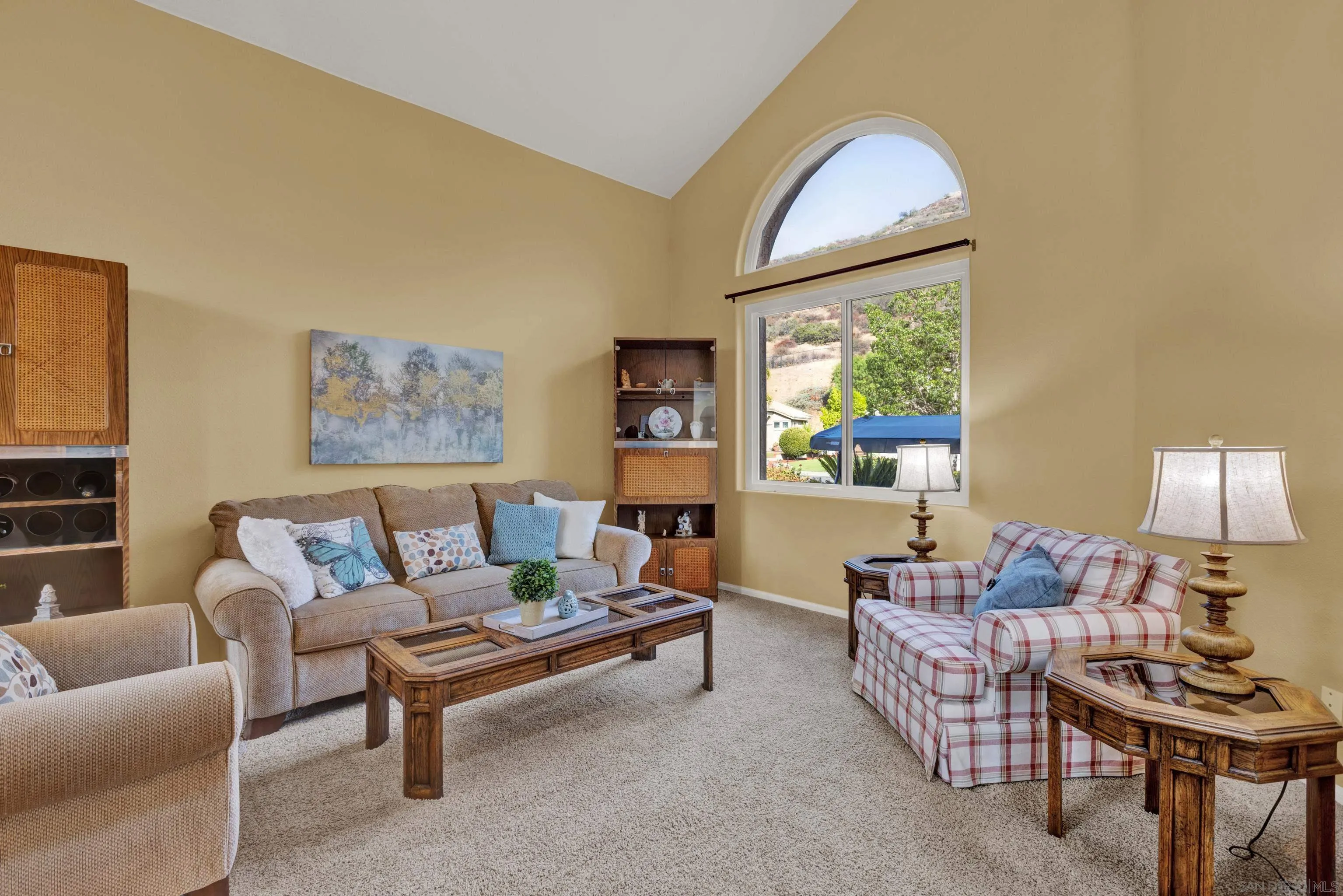 15550 Garden Road Poway, CA 92064 - Photo 8 of 48 a living room with furniture and a large window