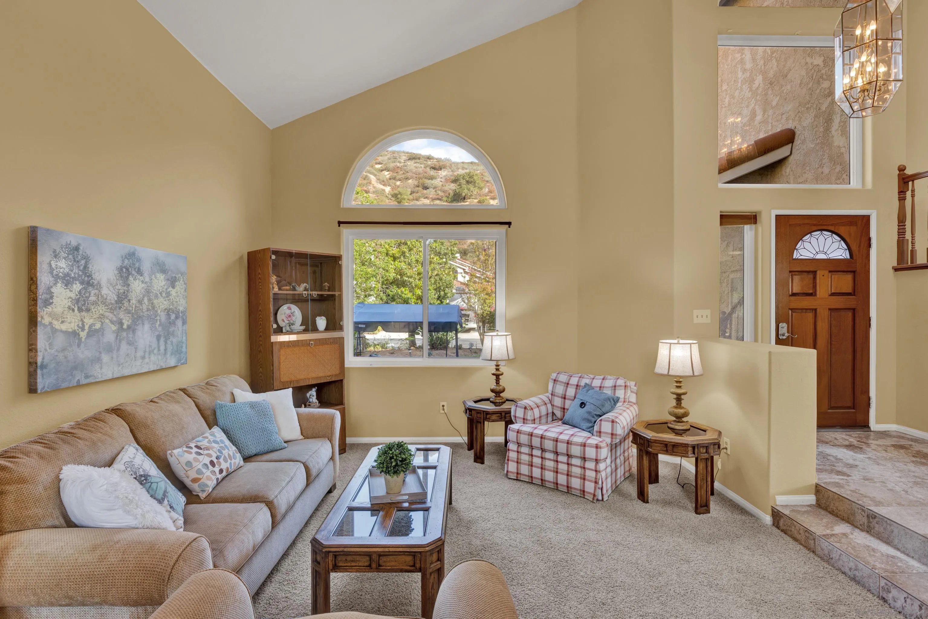 15550 Garden Road Poway, CA 92064 - Photo 9 of 48 a living room with furniture and a large window