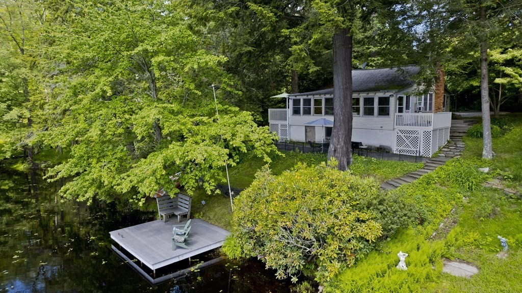 24 Farmhouse Road Chesterfield, MA 01012 - Photo 10 of 42 a wooden bench sitting in front of a white house