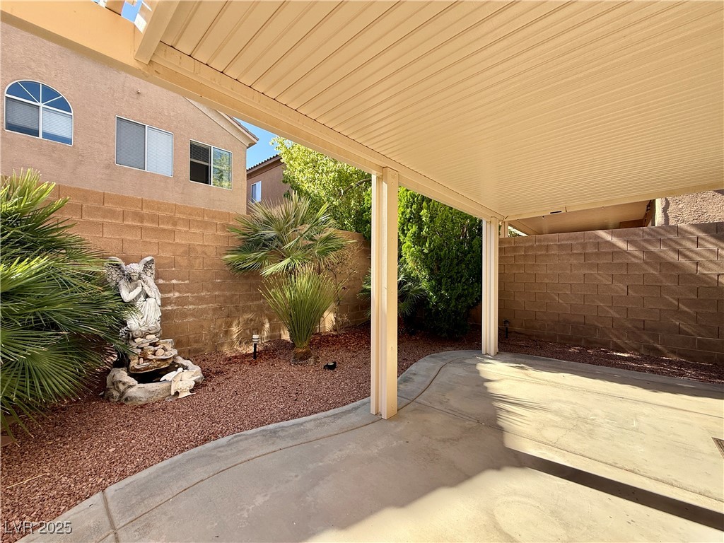 6031 Lamotte Avenue Las Vegas, NV 89141 - Photo 27 of 28 Fenced backyard featuring a patio