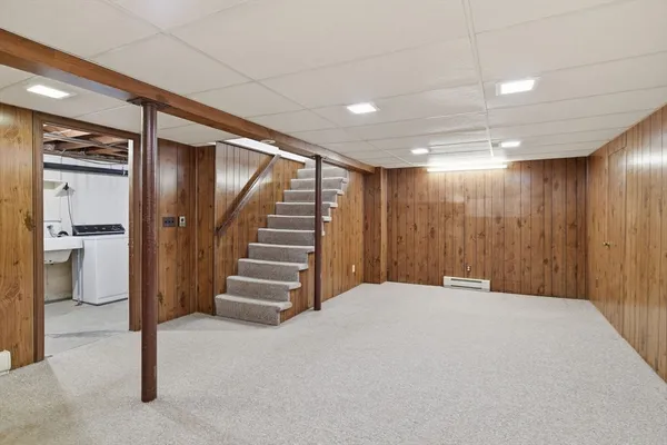 a view of an empty room with a gallery