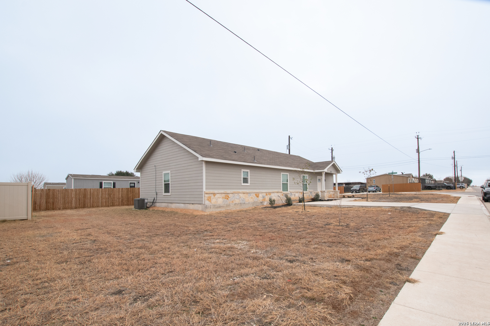 2621 Pahmeyer Road New Braunfels, TX 78130 - Photo 2 of 28 a view of a house with a big yard and large trees