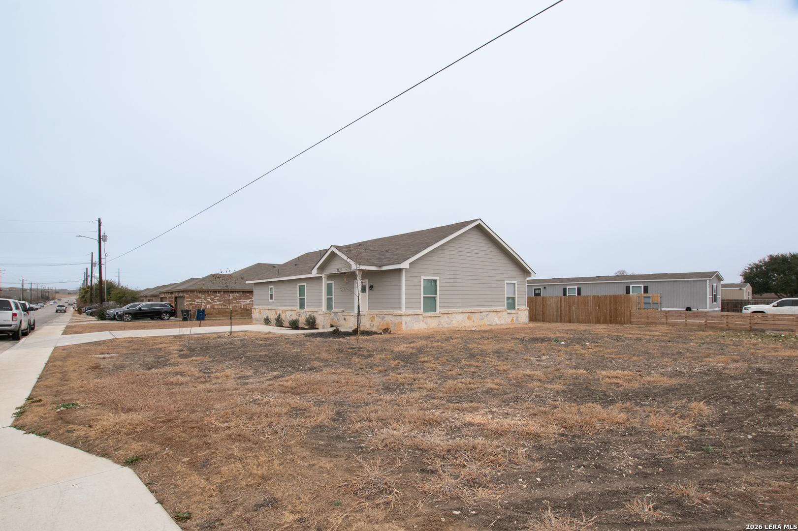 2621 Pahmeyer Road New Braunfels, TX 78130 - Photo 3 of 28 a big house with a big yard and more windows