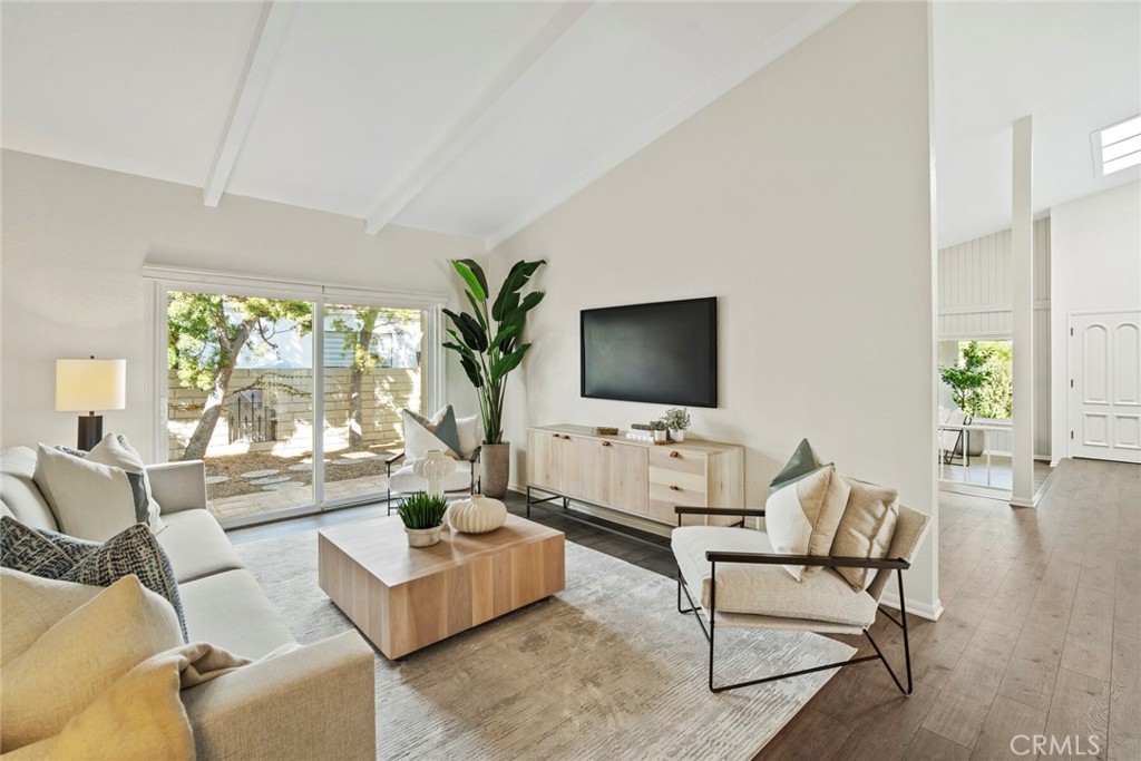 32321 Azores Road Dana Point, CA 92629 - Photo 13 of 46 a living room with furniture and a flat screen tv
