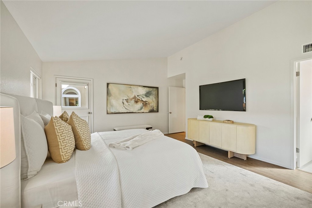 32321 Azores Road Dana Point, CA 92629 - Photo 14 of 46 a bedroom with a bed and a flat screen tv