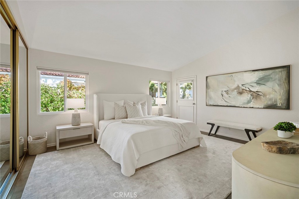 32321 Azores Road Dana Point, CA 92629 - Photo 15 of 46 a spacious bedroom with a bed and a couch