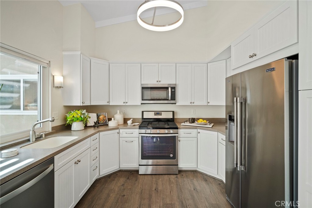 32321 Azores Road Dana Point, CA 92629 - Photo 21 of 46 a kitchen with stainless steel appliances a refrigerator sink and microwave