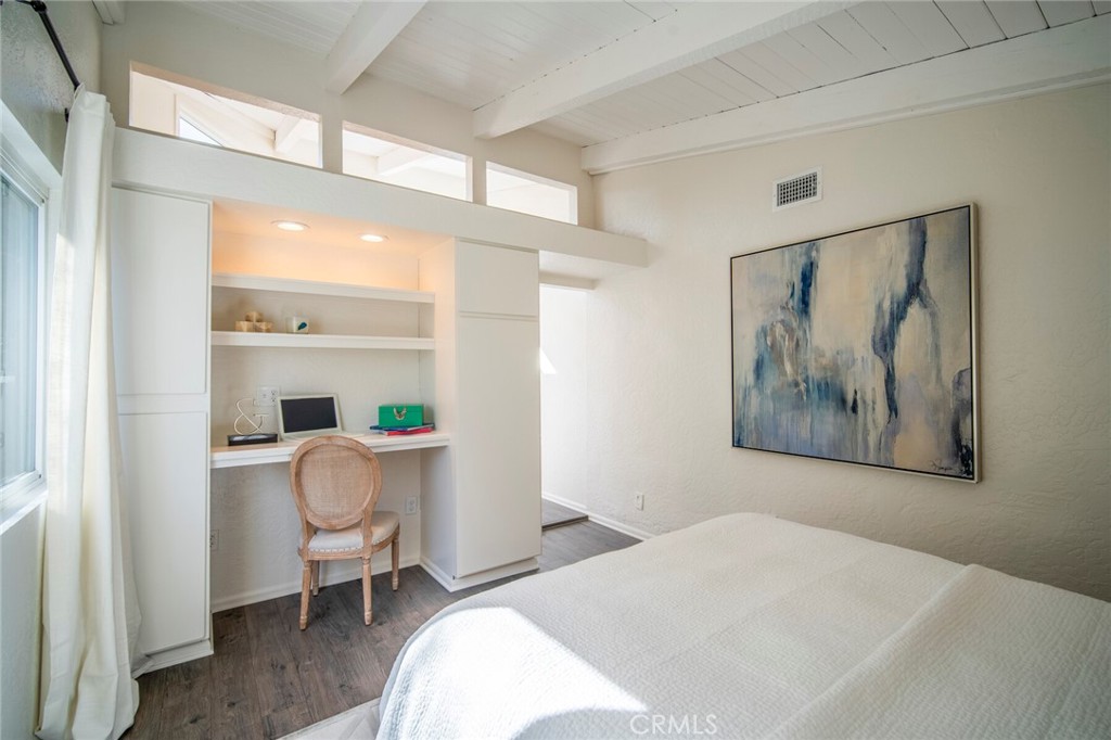 32321 Azores Road Dana Point, CA 92629 - Photo 24 of 46 a bedroom with a bed and a painting on the wall