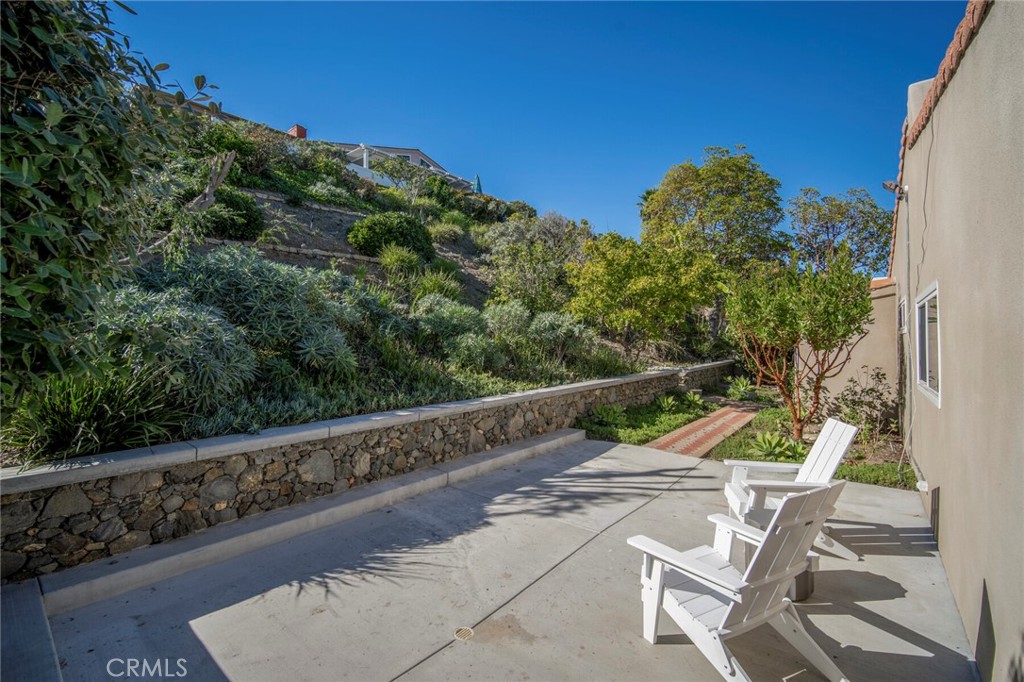 32321 Azores Road Dana Point, CA 92629 - Photo 27 of 46 a view of a swimming pool with a patio