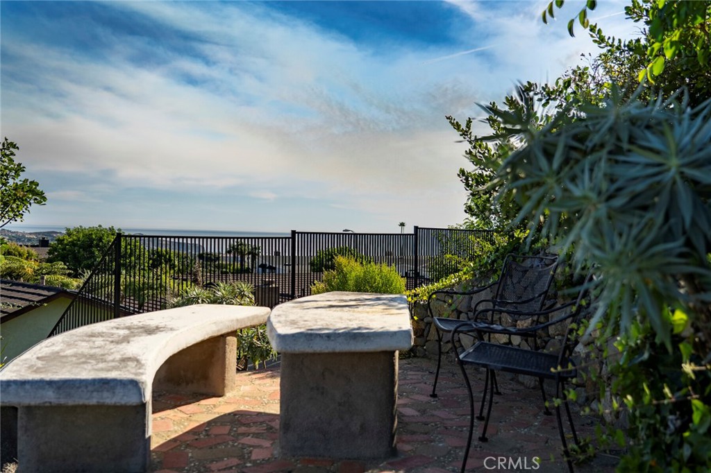32321 Azores Road Dana Point, CA 92629 - Photo 31 of 46 a view of a terrace with furniture and a garden