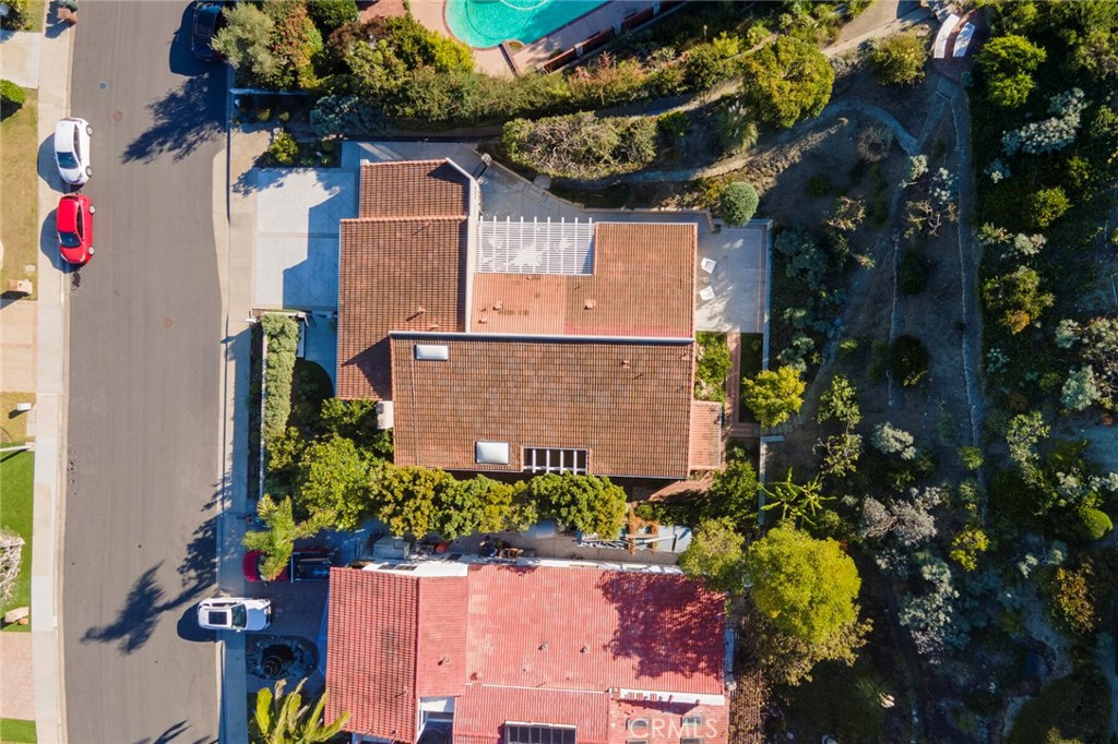 32321 Azores Road Dana Point, CA 92629 - Photo 34 of 46 an aerial view of a house with a yard and a lot of flower plants