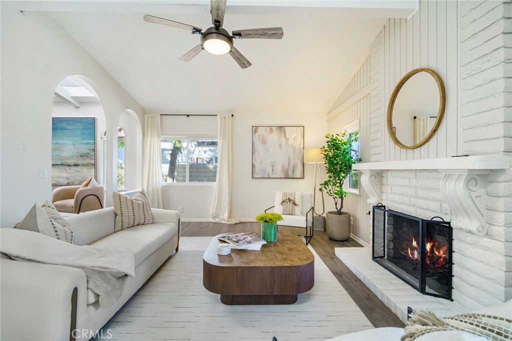 32321 Azores Road Dana Point, CA 92629 - Photo 5 of 46 a living room with furniture a window and a fireplace