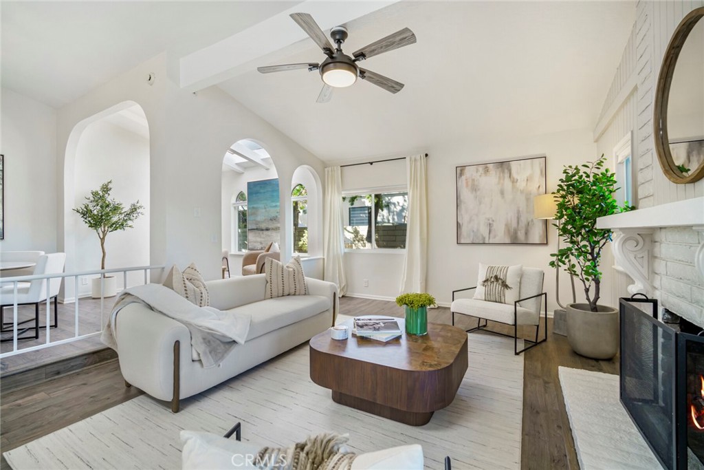 32321 Azores Road Dana Point, CA 92629 - Photo 6 of 46 a living room with furniture and a fireplace