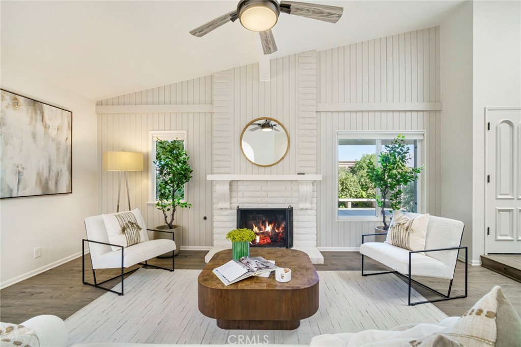 32321 Azores Road Dana Point, CA 92629 - Photo 7 of 46 a living room with furniture and a fireplace