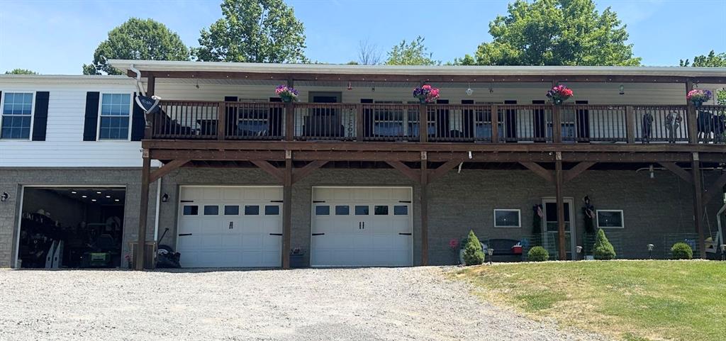 155 Crimm Road Ford City, PA 16226 - Photo 2 of 3 a front view of a house with a yard