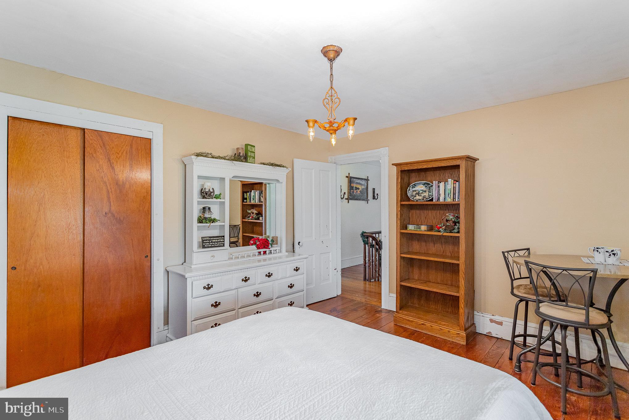 377 Pilottown Road Peach Bottom, PA 17563 - Photo 24 of 50 a bedroom with a bed and a chair in it