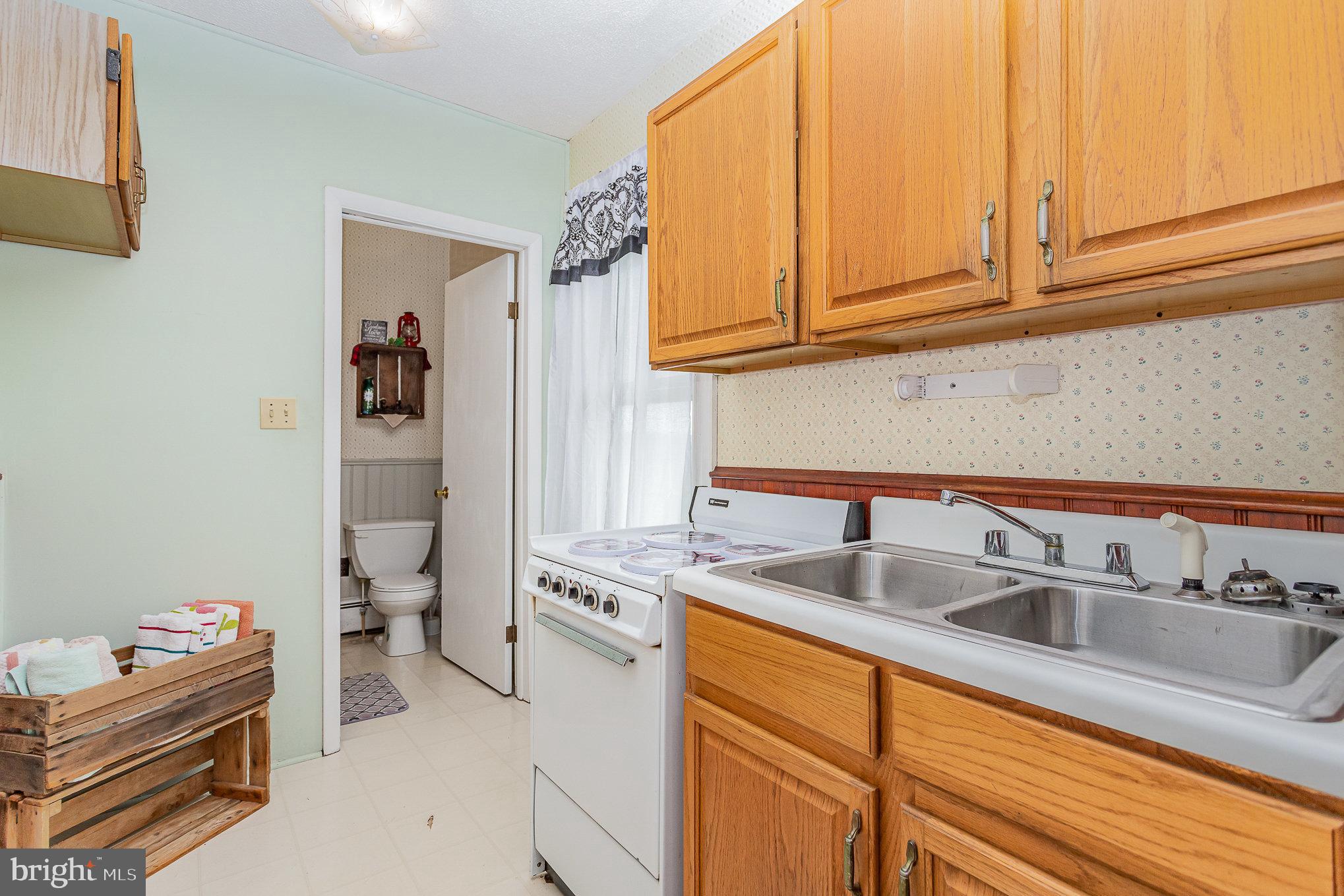 377 Pilottown Road Peach Bottom, PA 17563 - Photo 25 of 50 a kitchen with stainless steel appliances granite countertop a sink and dishwasher