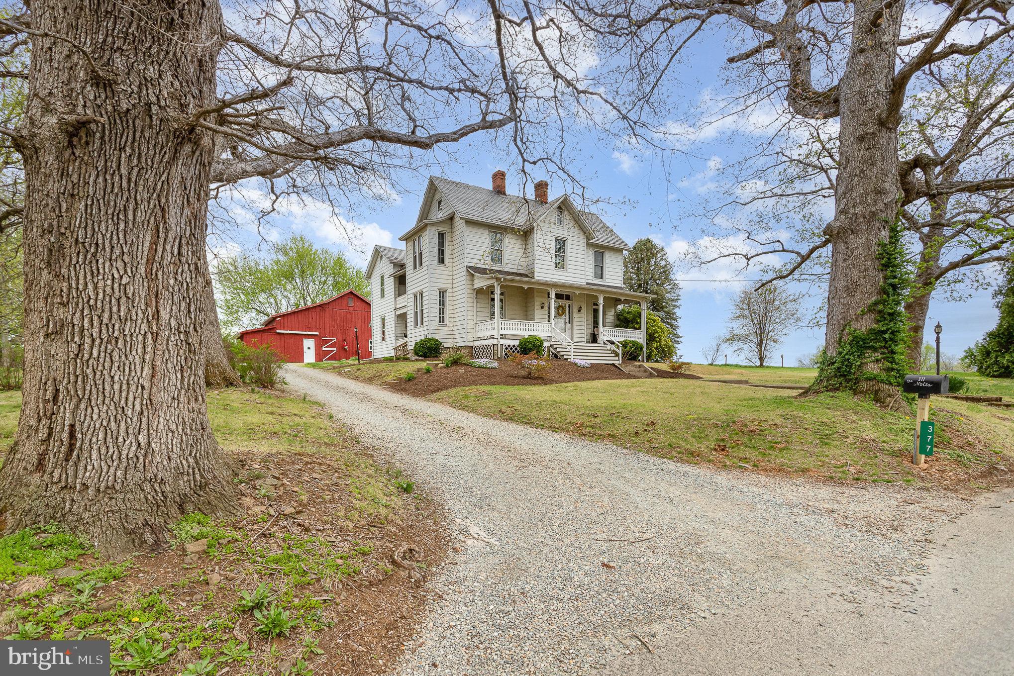 377 Pilottown Road Peach Bottom, PA 17563 - Photo 3 of 50 a front view of a house with a yard
