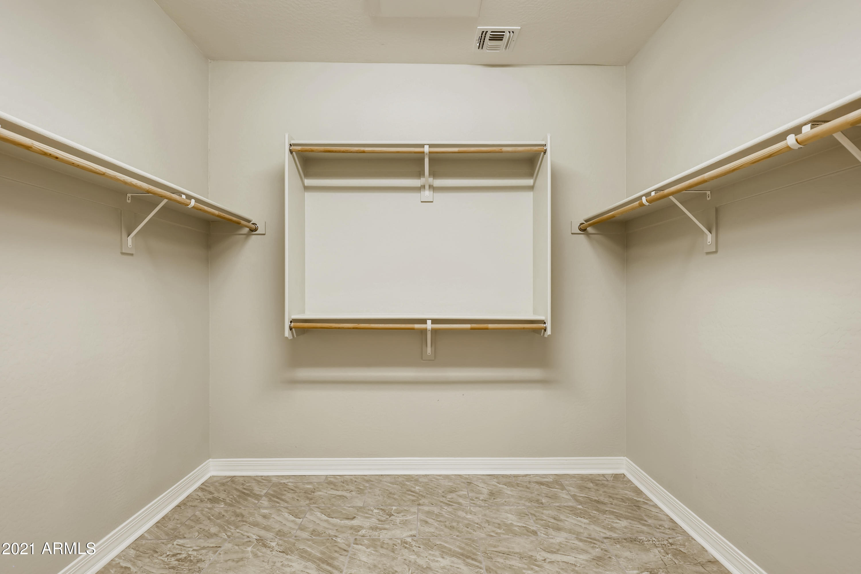 19698 North Flamingo Road Maricopa, AZ 85138 - Photo 22 of 33 21-407099336-48 Primary Bedroom Closet