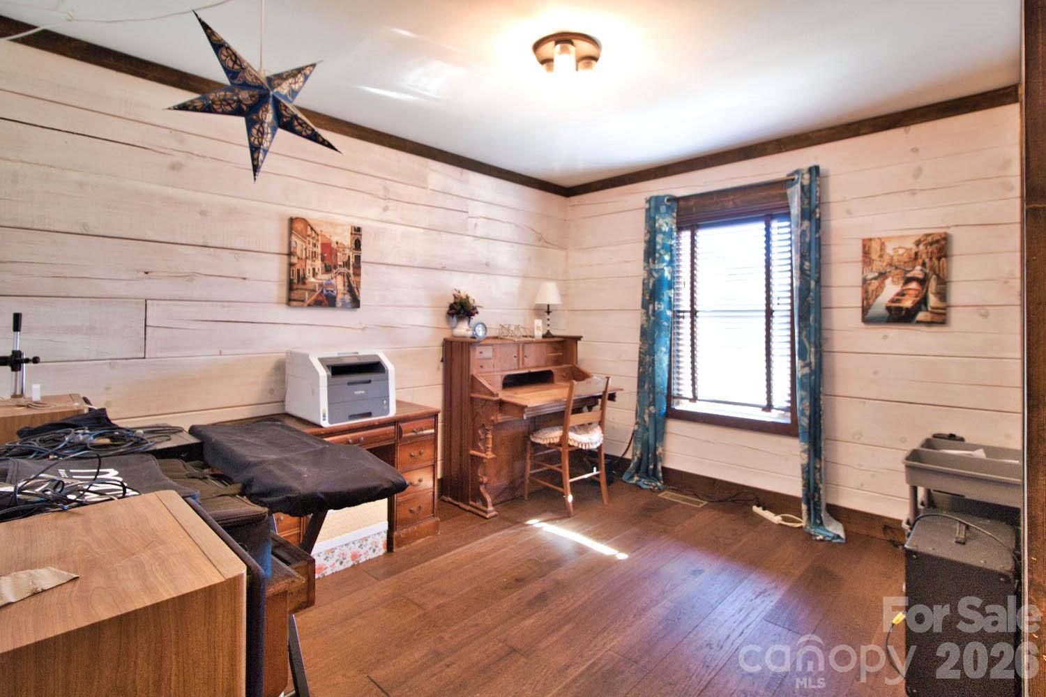 543 Moonlight Pass Union Mills, NC 28167 - Photo 13 of 24 a workspace with furniture and a window