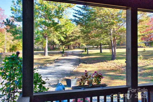 a view of a yard from a balcony