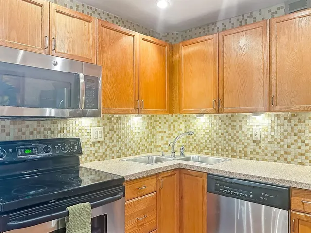 a room with furniture and a flat screen tv