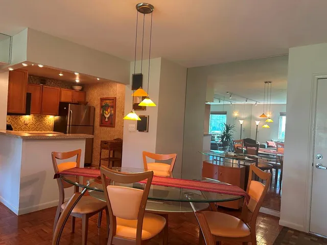 a living room with furniture and rug