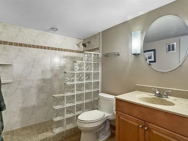 a dining room with furniture window and wooden floor